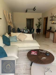 Two Bedrooms Apartment for sale with only 910k down payment and quarterly 182k over 10 years at Lugar Sheikh Zayed , 5 minutes from Beverly Hills