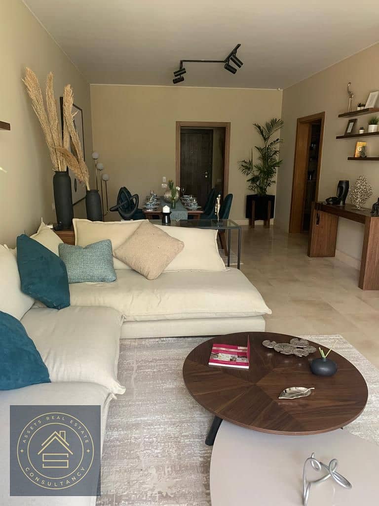 Two Bedrooms Apartment for sale with only 910k down payment and quarterly 182k over 10 years at Lugar Sheikh Zayed , 5 minutes from Beverly Hills 0