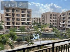 Half price apartment for sale, area 156 m, 3 rooms, landscape view, in Taj City Compound, on Suez Road, in front of Cairo International Airport