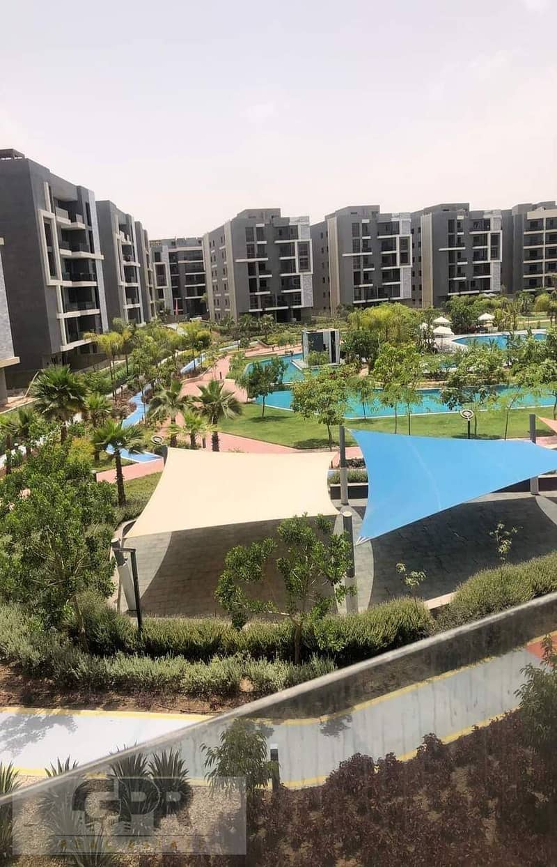 For quick sale, an apartment for sale, immediate delivery, in Sun Capital, October, in front of Mall of Arabia, Bayview, Pyramids 8