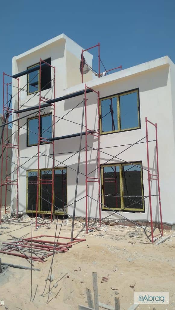 Townhouse for sale in The 8 Compound, Sheikh Zayed, 4 minutes from Dahshur Link, with installments over 10 years 1