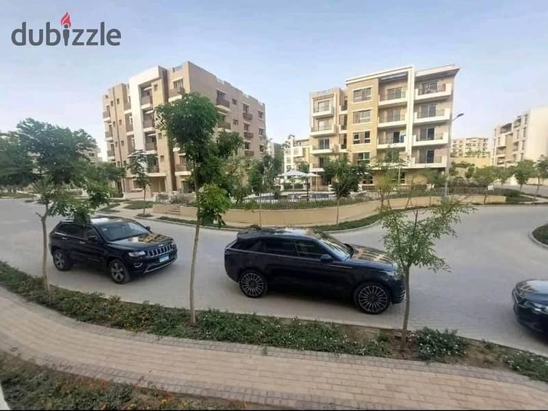 Apartment with garden for sale with 42% off its price in Taj City Compound 3