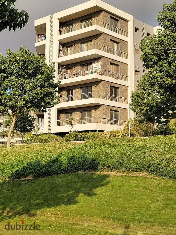 Apartment with garden for sale with 42% off its price in Taj City Compound 4