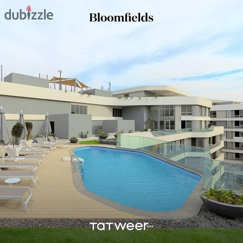 Fully Finished Apartment with a 5% Down Payment in the Best Location in Future City, near Madinaty and the airport, in Bloomfields Compound by Tatwer 2