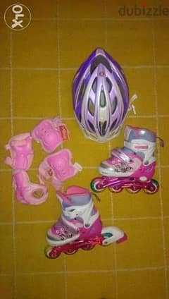 barely used Rollerblade + knee shields + helmet adjustable to 4 sizes 0