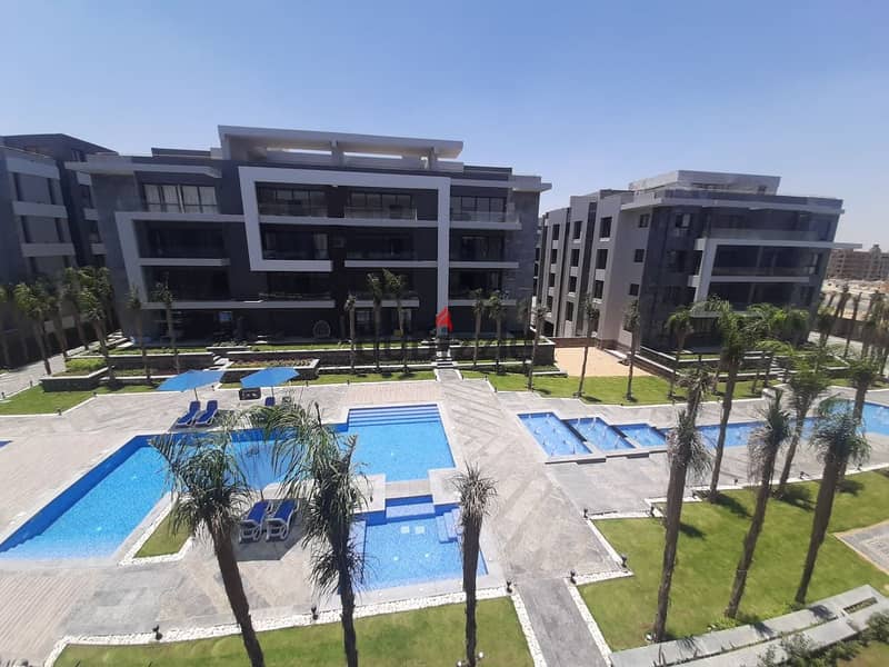 Apartment Ready To Move in El Patio Oro Lavista in Fifth Settlement In golden square A very distinctive view of the landscape and water bodies 0