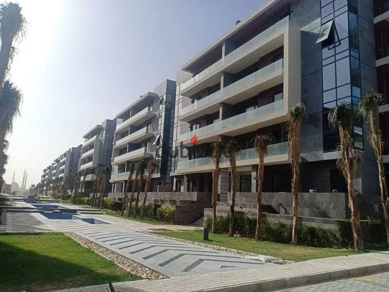 Apartment in El Patio Oro Lavista in Fifth Settlement In golden square A very distinctive view of the landscape and water bodies 6