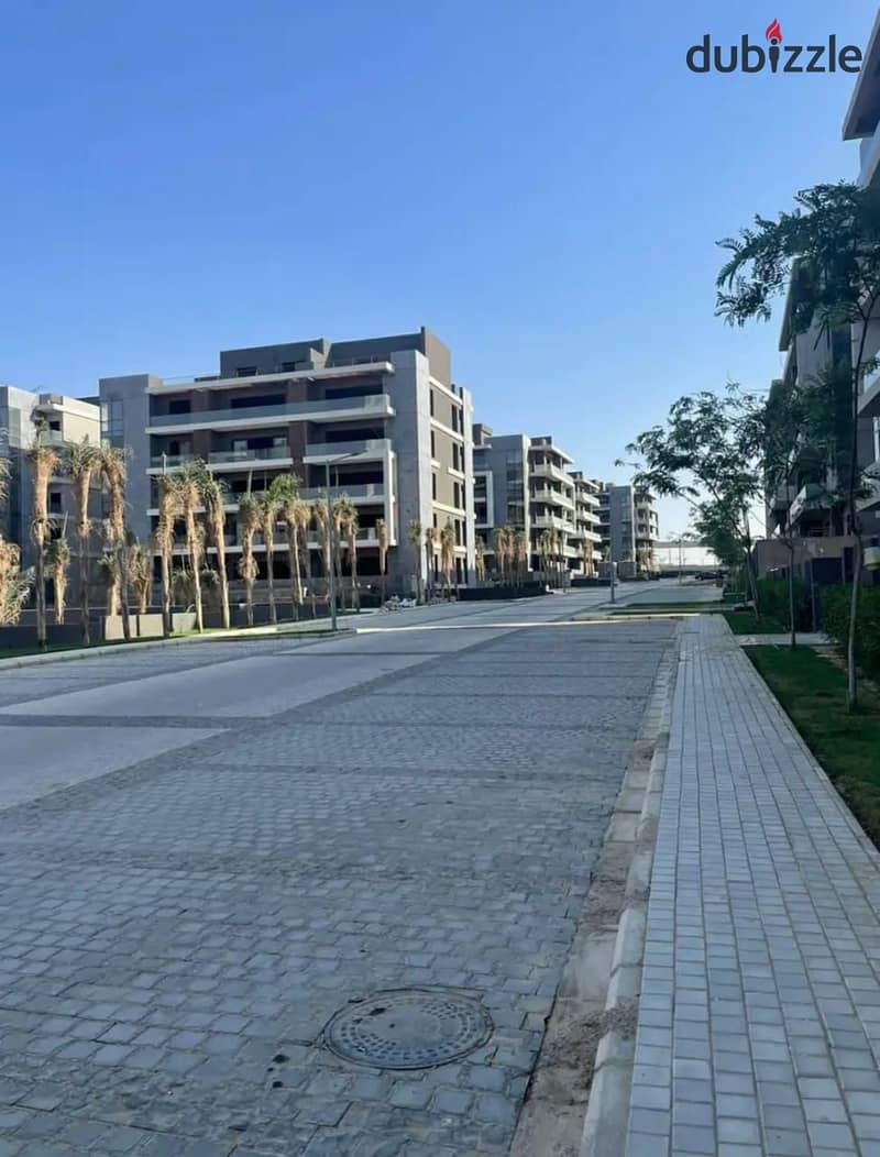 Apartment in El Patio Oro Lavista in Fifth Settlement In golden square A very distinctive view of the landscape and water bodies 7