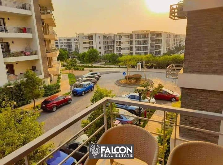 For sale with a fantastic view of the landscape, an apartment of 130 square meters in front of Cairo Airport and next to the Marriott Hotel in Taj Cit 9