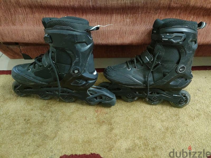 two adult inline fitness skates fit 100 ,,  عدد اتنين (٢) اسكيت 2