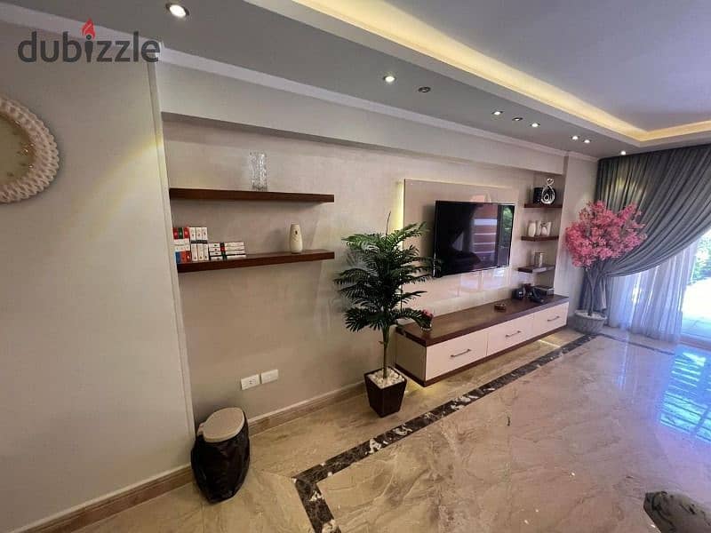 Furnished apartment for sale, Sheikh Zayed, Green 3, in front of Americana Plaza, at a special price 4