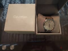 clavin klein watch mint condition grey leather strap