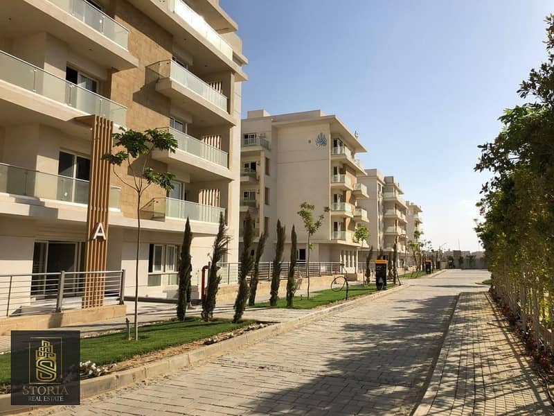 For quick sale, 140m apartment with a garden, ready to delivery, in Mountain View ICity new Cairo, interest-free installments, next to Madinaty 9