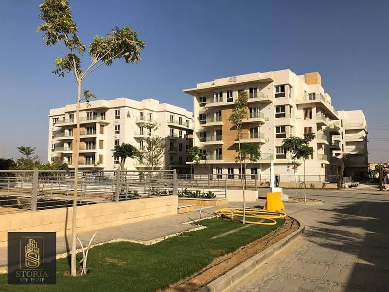 For quick sale, 140m apartment with a garden, ready to delivery, in Mountain View ICity new Cairo, interest-free installments, next to Madinaty 10