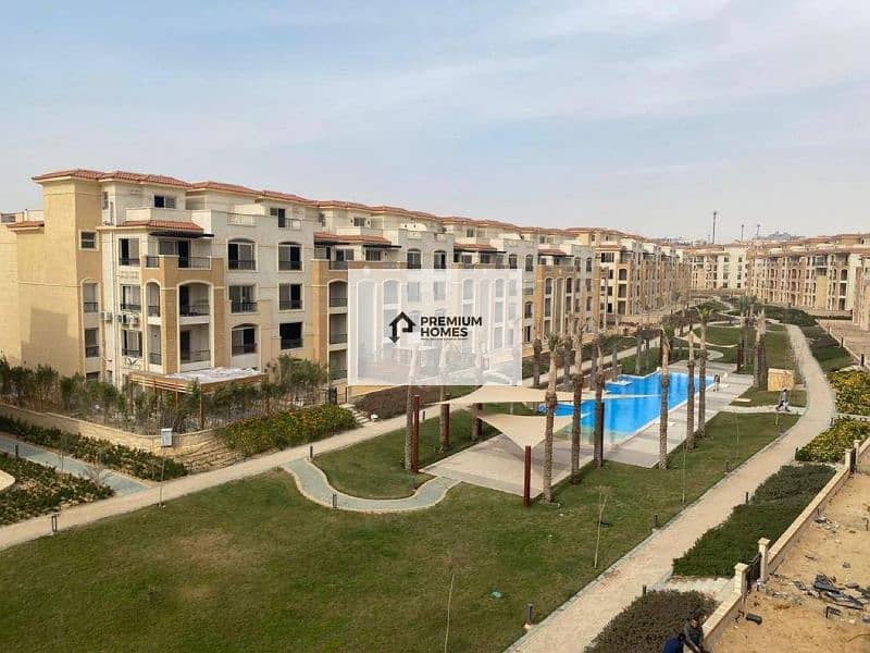 Apartment 140 m open landscape view immediate delivery at a bargain price in Stone Residence Compound in the Fifth Settlement 6