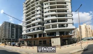 Directly in front of City Stars Mall and Nozha Street Ready to move commercial store for sale with installments in Nasr City Go Heliopolis Compound