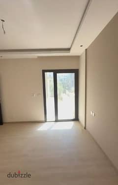 round floor apartment with a super luxury garden, ready to move and installments over 3 years, in The Address East Compound