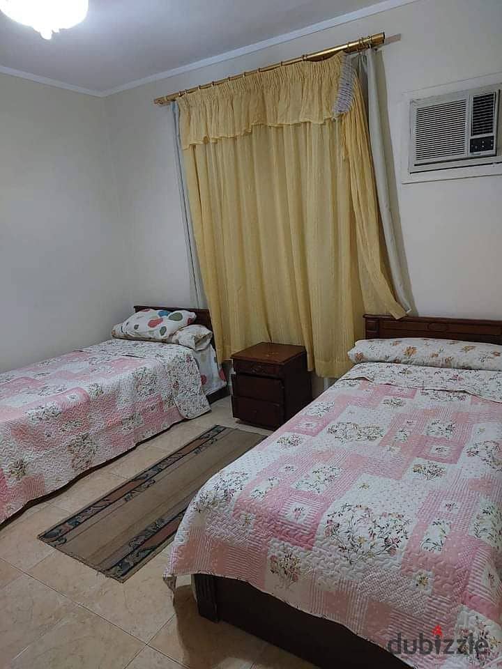 Furnished apartment for rent in front of the International Park in the 7th District in Nasr City 11