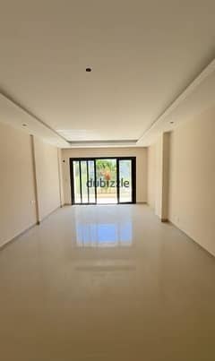 Ground floor apartment in garden with 20% down payment and installments over 4 years in The Address East Compound