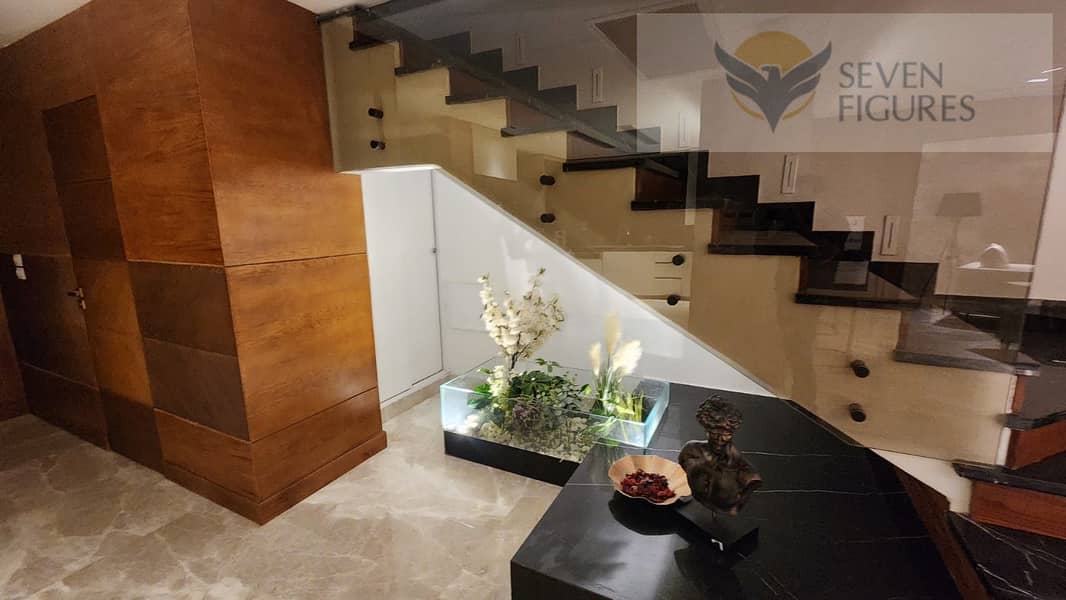 Twinhouse for sale Mivida new cairo Very Prime location Fully Finished with ACs and fully furnished ready to move with big garden facing north + roof 21