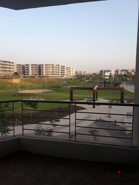 A luxury 115m apartment for sale + Garden in installments in front of Cairo Airport in Taj City 11