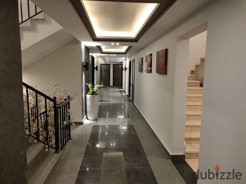 Apartment for sale with immediate receipt in the most prestigious compound in October, “Sun Capital” | 10% down payment and installment facilities up 10