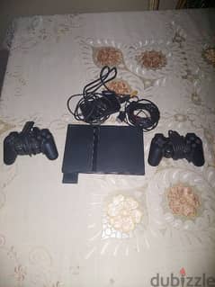 ps2 slim+2 original dualshock2+32 games+8 mb memory card