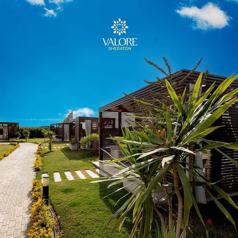 Apartment for sale in installments, fully finished, on a very special landscape, in the Valore Sheraton Compound. 1