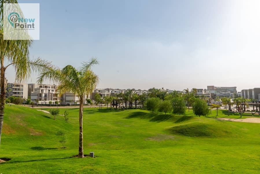 Prime location apartment, distinguished division, for sale in a compound with integrated services, directly on the Suez Road, Taj City Compound 7