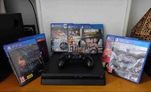 Playstation 4 slim 500GB + 1 controller + 7 Games 0