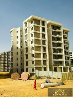 "A ground floor apartment with a garden in Noor City, the first fully integrated smart city. " 0