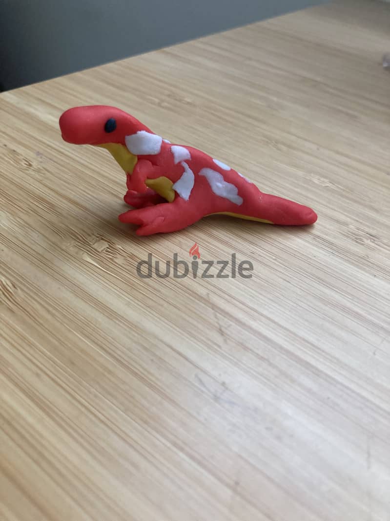 A hand made polymer clay dinosaur toy 1