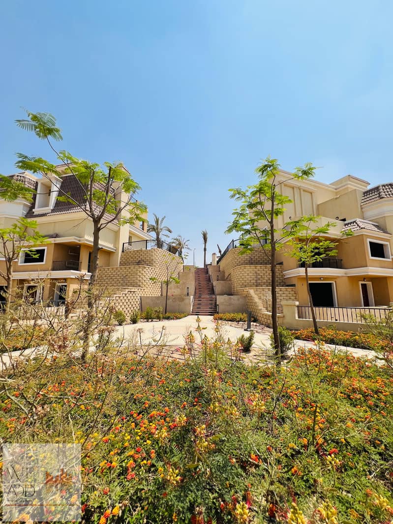 Next to Sarai Compound, book a distinctive corner townhouse of 260 m, 4 floors, with a 180 m garden, for sale in The Butterfly Compound in Mostakbal 25