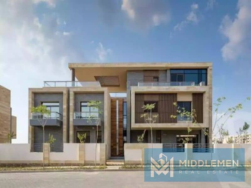 Q villa duplex 204 m garden 39 m delivery 2024 prime location , taj city new cairo 7