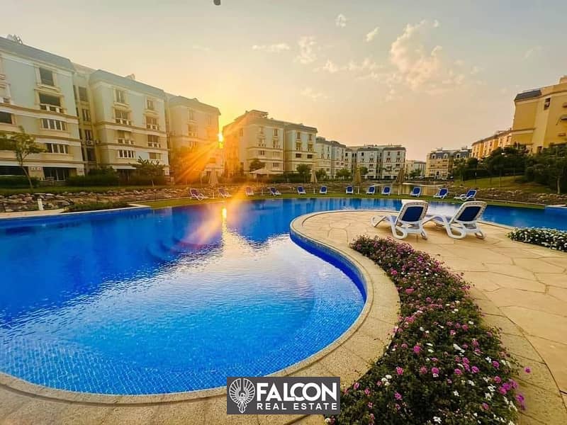 For sale, an apartment of 130 meters directly on the landscape and Crystal Lagoon in Aliva Mountain View, New Cairo, Aliva, in installments for 8 year 2