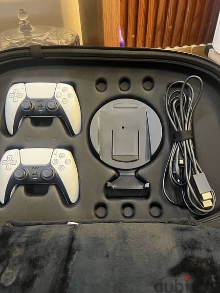 ps5 with 2 controller and 5 disc same like new 3