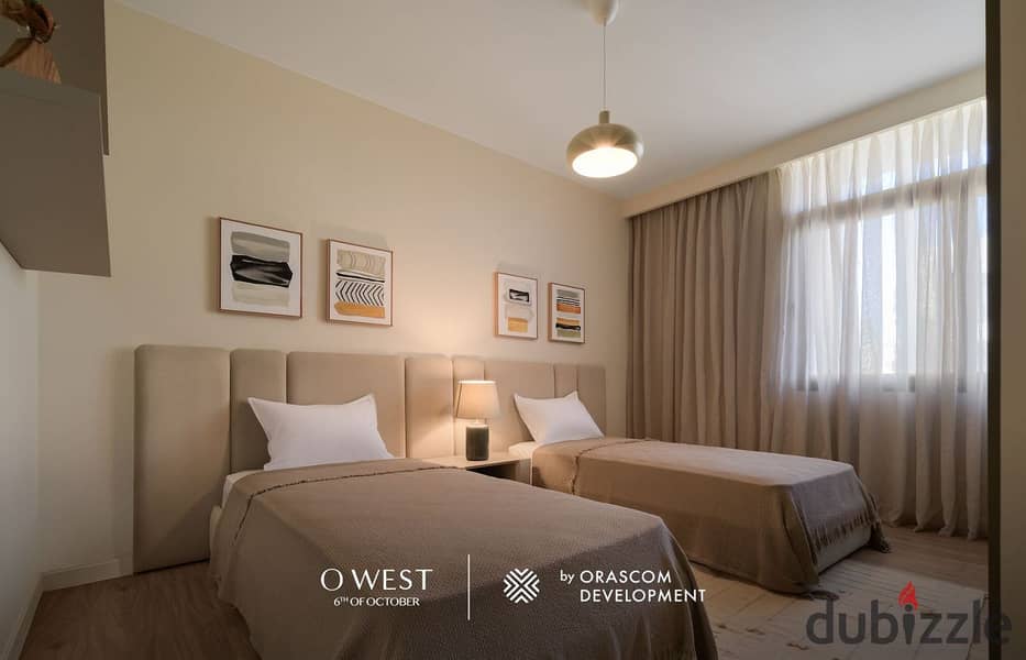 Apartment for sale in O west - Direct on Wahat Road -- Ready to move - Instalments over 7 years 11