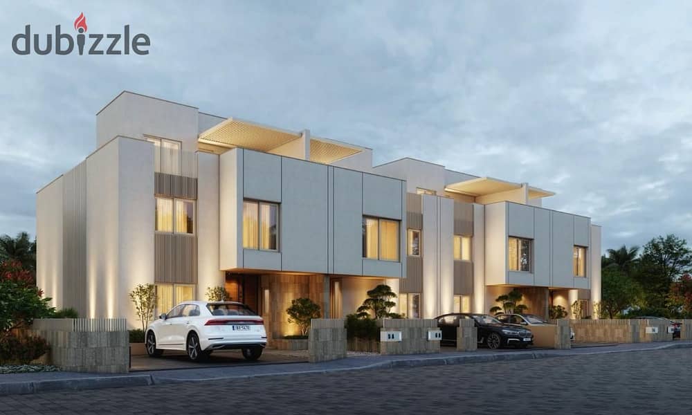 Own a luxurious villa directly on Dahshur Road, in installments over 8 years, in a prime location in Sheikh Zayed, next to KARMA GATES 3