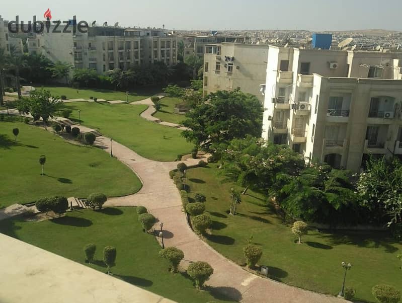 apartment with garden for sale ready to move compound in elsheikh zayed 9