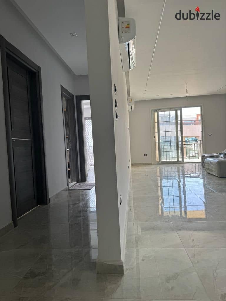 Apartment 140m semi furnished for rent in regents park new cairo 1