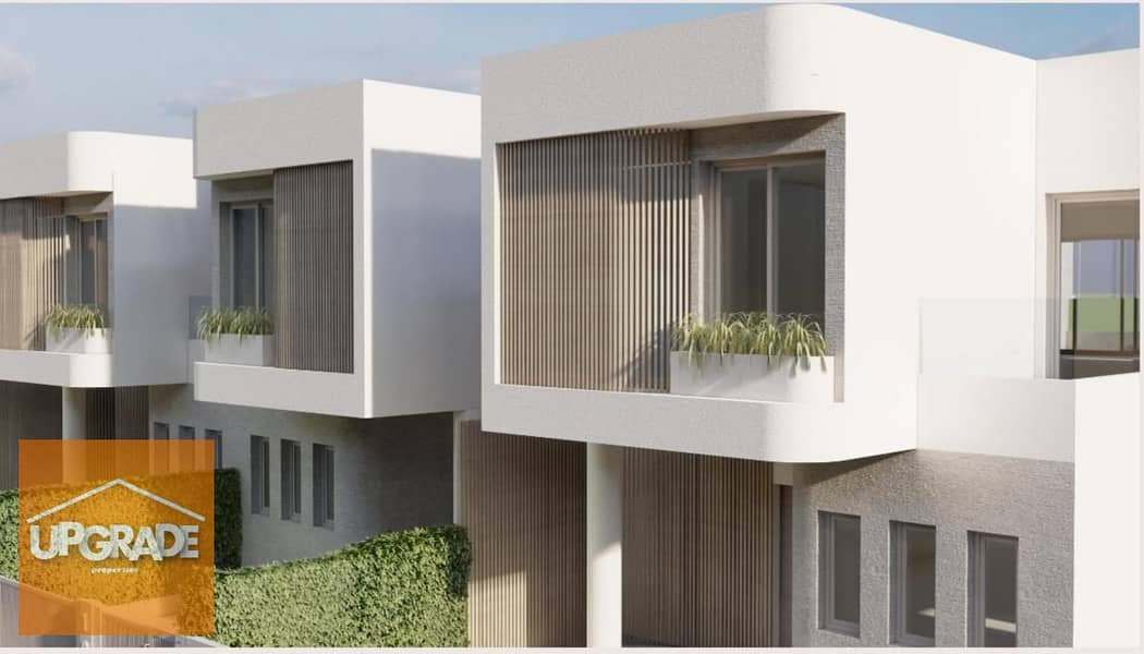 Townhouse villa, 244 sqm, distinctive corner view, in The Islands, from Egy Gab, the Administrative Capital, 15% down payment and installments over 9 4