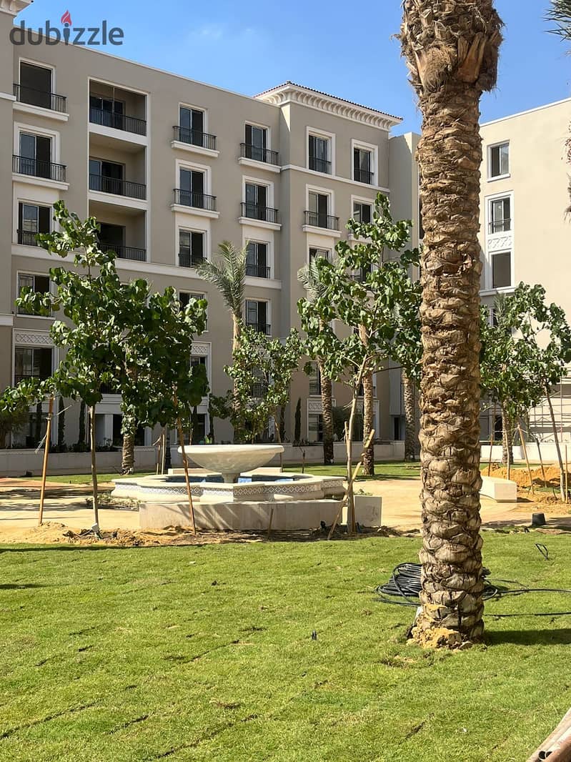 For sale, fully finished, 3-bedroom apartment, in installments, Village West Compound, Zayed 5