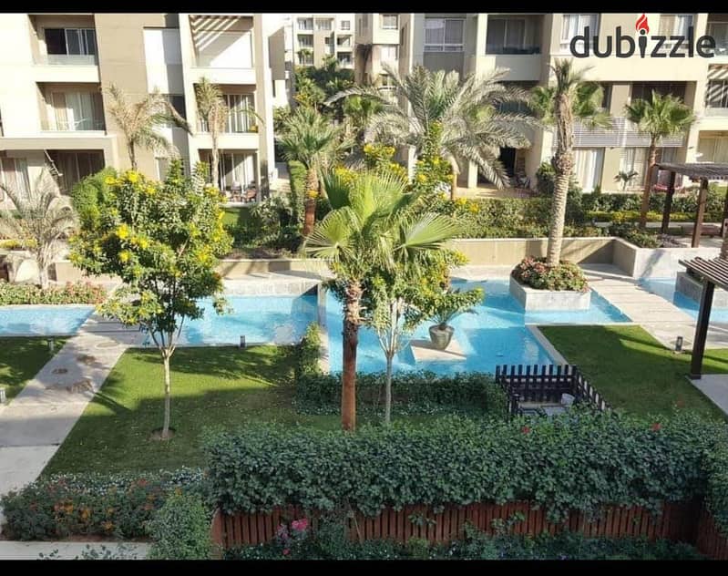 Apartment for sale in Swan Lake Compound, Hassan Allam, First Settlement, directly in front of Rehab 1