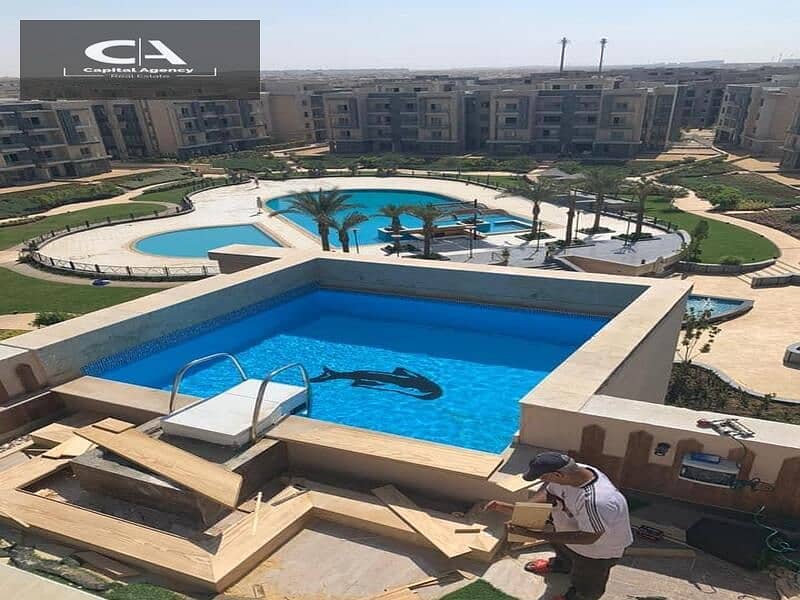 With a 37% cash discount, an apartment with a garden for sale, immediate delivery, in the heart of Golden Square in the Galleria Compound | 10% DP 13