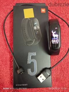 Mi band 5 معاها الشاحن و العلبة 0