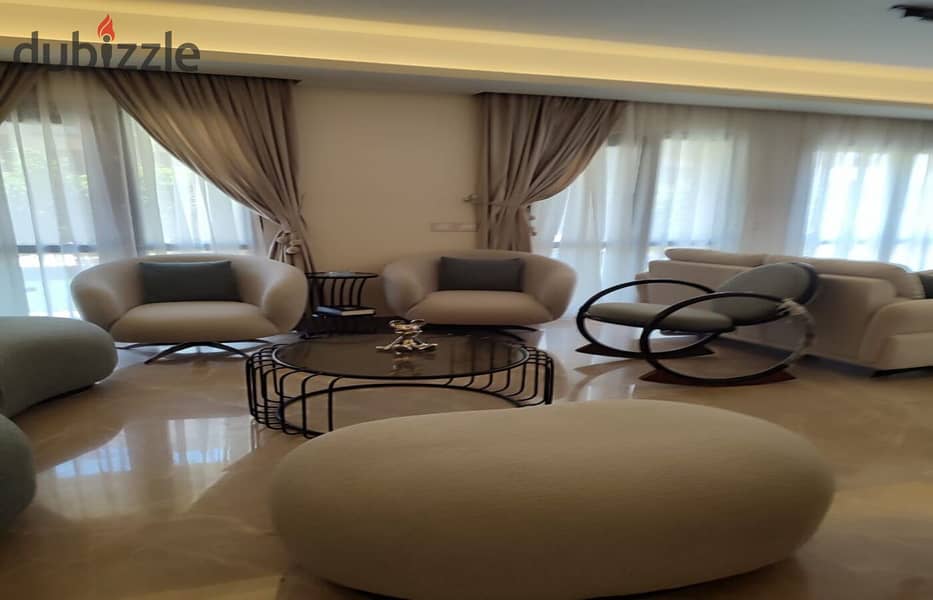 furnished Apartment with garden for rent in Eastown new cairo 1