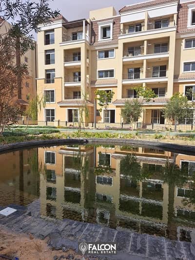 For sale, an apartment with a garden (with a 42% discount for cash + installments) next to Madinaty in New Cairo in Sarai Compound