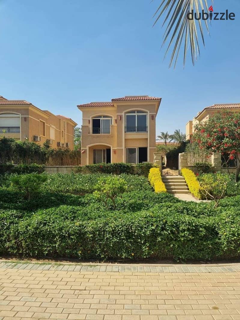 For sale, an independent villa of 452 square meters in Stone Park, New Cairo, in installments, next to Katameya Heights 1