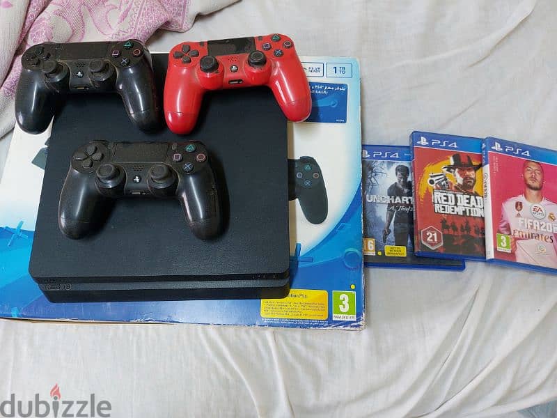 ps4 slim 1 tb + 3 controllers + 3 games 2