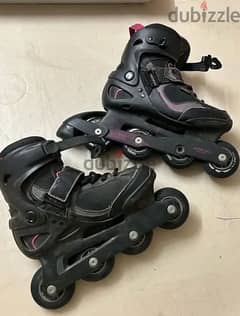 Roller blades/ skates بتيناج